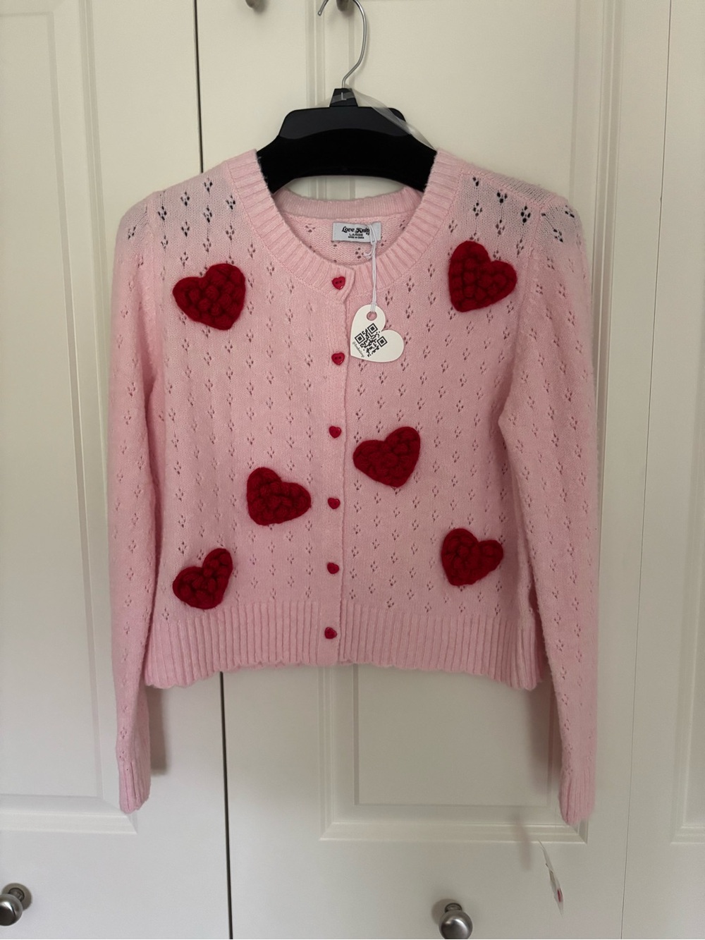 Love Knit cardigan light pink knit fabric with textured hearts size large. NWT